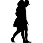 Boy and girl walking silhouette
