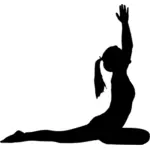 Wanita dalam yoga pose