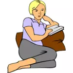 Vektorgrafik, die Frau, die Lektüre eines Buches auf einem Kissen