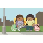 Niños de la escuela esperando el autobús
