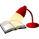 Livre ouvert et lampe de lecture