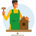 Man building a birdhouse
