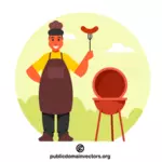 Chef sosteniendo tenedor con una salchicha
