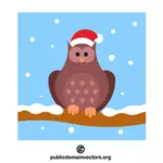 Świąteczna sowa w czapce Świętego Mikołaja