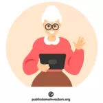 Bilgisayar tableti kullanan yaşlı kadın