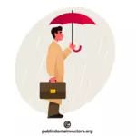 Empresário com guarda-chuva