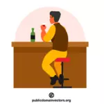Mężczyzna pijący w barze