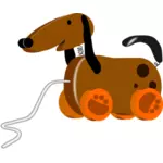 Immagine di vettore di cane tirare giocattolo