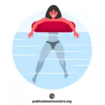 Женщина плавает в море