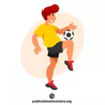 Jonge voetballer die een bal schopt